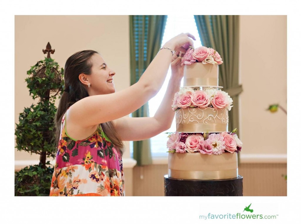 3 tier wedding cake with pink flowers